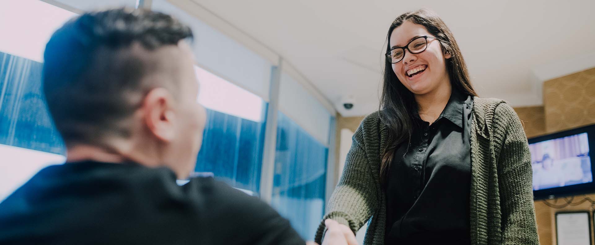 Patient shaking hands in dual diagnosis treatment